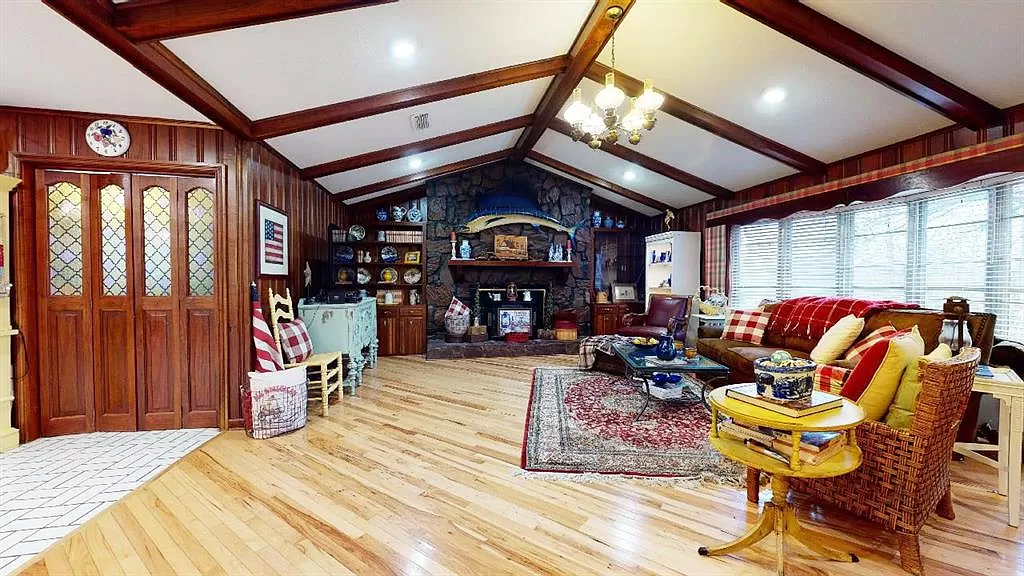 One of a kind Living Room with river rock and unique woods from the hills for Texarkana, AR.